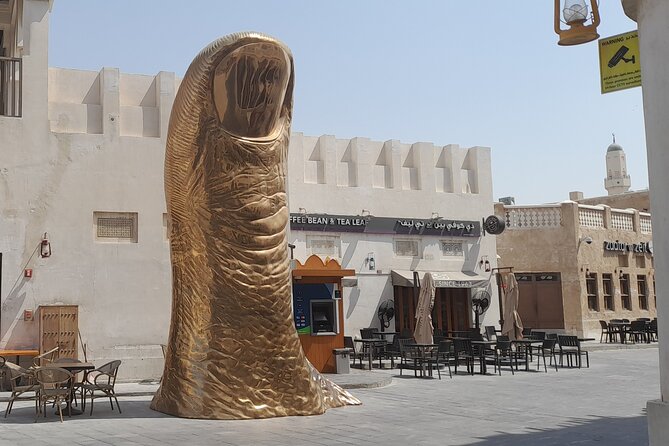 Walking Tour: Discover Souq Waqif, An Almost Free Walking Tour - Horses and camels near the market lanes